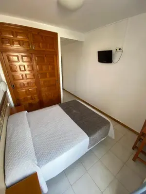 Cama o camas de una habitación en Hotel Simón