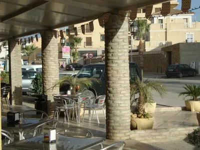 Un restaurante o sitio para comer en Hotel Lucero