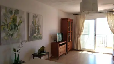 Una televisión o centro de entretenimiento en Primerísima línea de playa