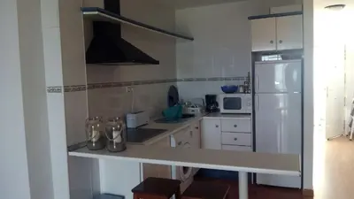Una cocina o zona de cocina en Primerísima línea de playa