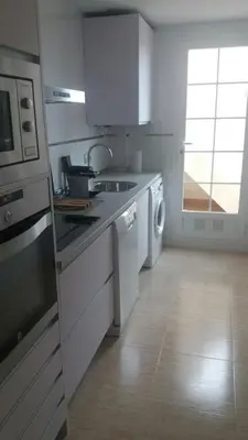 Una cocina o zona de cocina en Apartments Sol de Almeria Golf y Playa