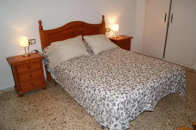 Cama o camas de una habitación en Playa Delicias