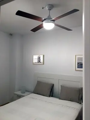 Cama o camas de una habitación en APARTAMENTO CON VISTAS AL MAR. PRIMERA LINEA DE PLAYA.