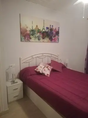 Cama o camas de una habitación en PRECIOSO ADOSADO a 100 METROS DEL MAR en VERA-PLAYA!