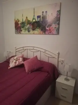 Cama o camas de una habitación en PRECIOSO ADOSADO a 100 METROS DEL MAR en VERA-PLAYA!