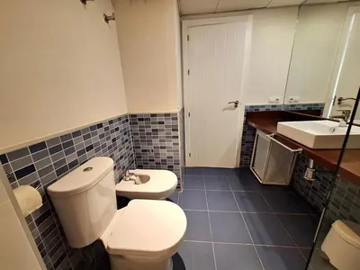 Un baño de Apartamentos Alborada III