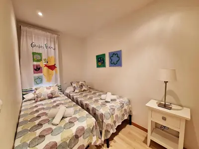 Cama o camas de una habitación en Apartamentos Alborada III