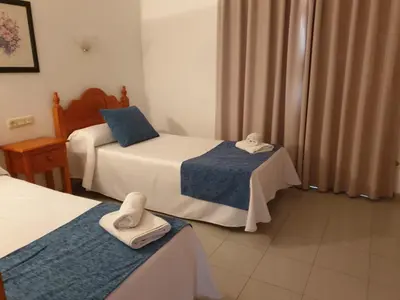 Cama o camas de una habitación en Apartamentos Vera Coast