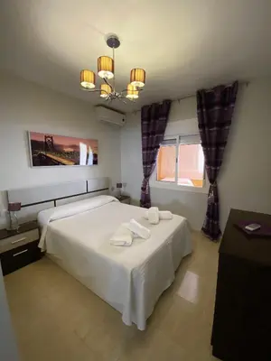 Cama o camas de una habitación en Apartamento Aguadulce Playa