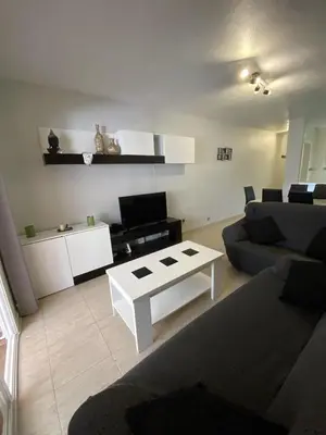 Una televisión o centro de entretenimiento en Apartamento Aguadulce Playa