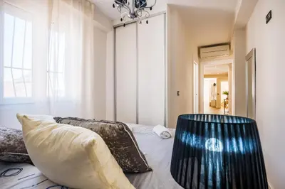 Zona de estar de Expoholidays-Rueda Lopez apartamento de lujo