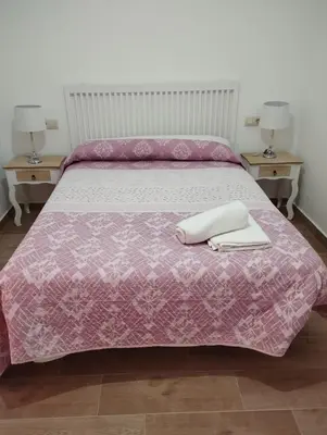 Cama o camas de una habitación en Apartamentos El Galán