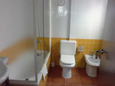 Un baño de Apartamentos El Galán