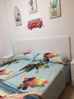 Cama o camas de una habitación en Apartamento Lujo, Primera linea playa, Garaje, Wifi, Piscina climatizada