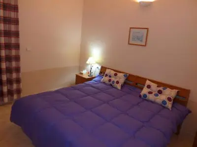 Cama o camas de una habitación en Duplex Naturista urb. Vera Natura