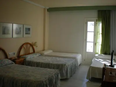 Cama o camas de una habitación en Hotel Terraza Carmona