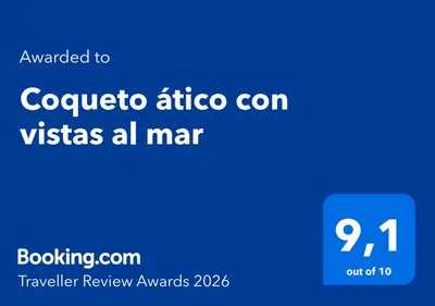 Certificado, premio, señal o documento que está expuesto en Coqueto ático con vistas al mar