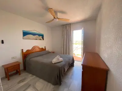 Cama o camas de una habitación en Duplex Turisticos MojaMar Playa