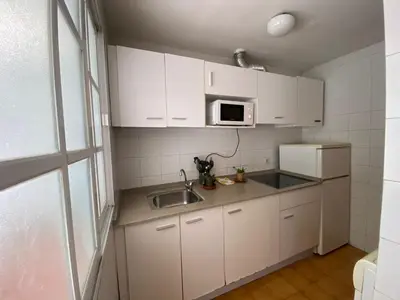 Una cocina o zona de cocina en Duplex Turisticos MojaMar Playa