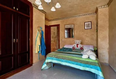 Cama o camas de una habitación en Casa de Sueño en la Playa