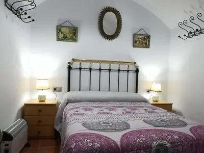Cama o camas de una habitación en Cueva Tradicional El capricho