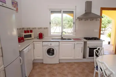Una cocina o zona de cocina en Villa Mariana