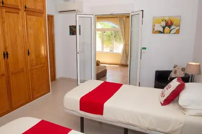 Cama o camas de una habitación en Villa Mariana