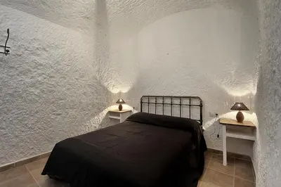 Cama o camas de una habitación en Cueva Solano