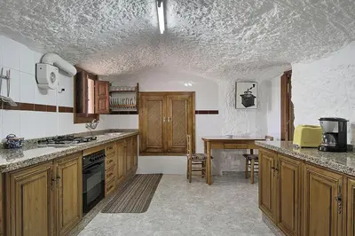 Una cocina o zona de cocina en Cueva Solano