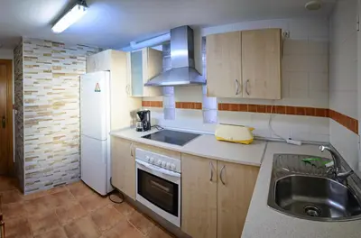 Una cocina o zona de cocina en Apartamento 90 m2 en la mejor zona de Roquetas