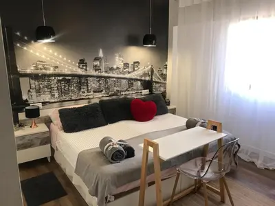 Cama o camas de una habitación en Céntrico ,Moderno y confortable Apartament