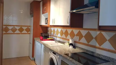 Una cocina o zona de cocina en Al Andalus Thalassa III VERARENTAL-COM