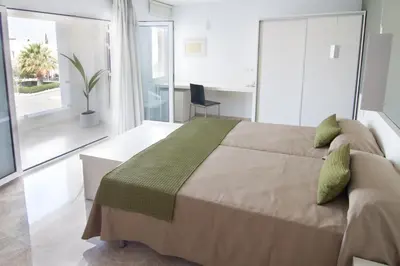 Cama o camas de una habitación en Hotel Senderos
