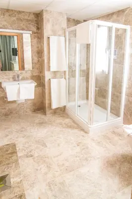 Un baño de Hotel Senderos