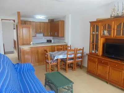 Una cocina o zona de cocina en Apartamento en la Playa de San José-sjjc