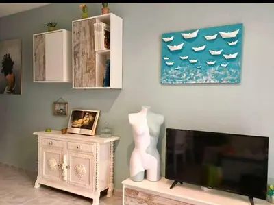 Una televisión o centro de entretenimiento en Casa Coquina. Vera Natura. Urbanizacion naturista