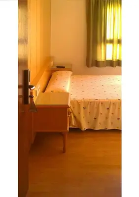 Cama o camas de una habitación en Hostal Centro Ejido