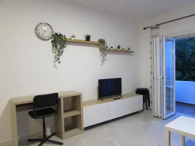 Una televisión o centro de entretenimiento en MOJACAR HOME AND BEACH