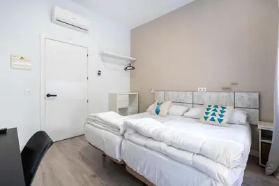 Cama o camas de una habitación en BF Rooms Almeria Centro