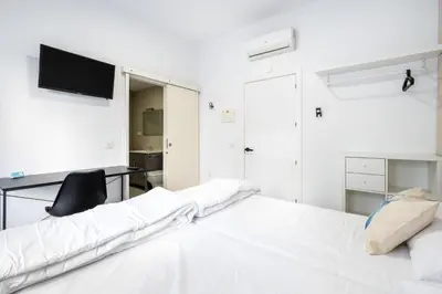 Cama o camas de una habitación en BF Rooms Almeria Centro