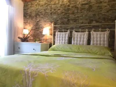 Cama o camas de una habitación en Casa con encanto en Calabardina, cerca de la playa
