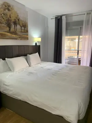 Cama o camas de una habitación en Hotel Carlos III