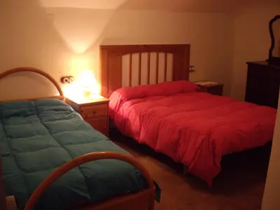 Cama o camas de una habitación en Cuevas Rio Baza