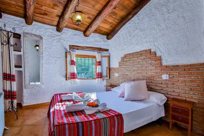 Cama o camas de una habitación en Cuevas El Moral