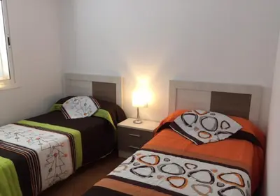 Cama o camas de una habitación en Trendy Homes Apartamento Isleta