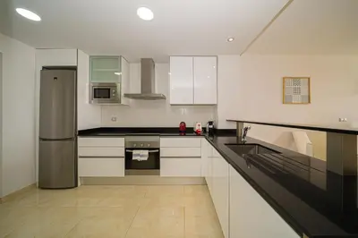 Una cocina o zona de cocina en Mango