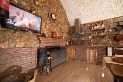 Una cocina o zona de cocina en Cuevas Cortijo Gachas