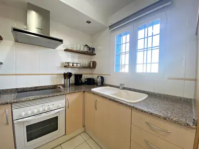 Una cocina o zona de cocina en Las Casitas de la Playa