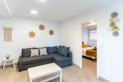 Zona de estar de Apartamento Torre Cervantes, moderno, luminoso, a 5 min de la Playa
