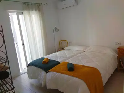 Cama o camas de una habitación en Abá apartamento